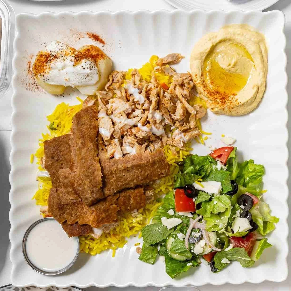 Fresh Chicken Shawarma Wrap with garlic sauce at Shawarmero Lebanese Grill Calgary SE